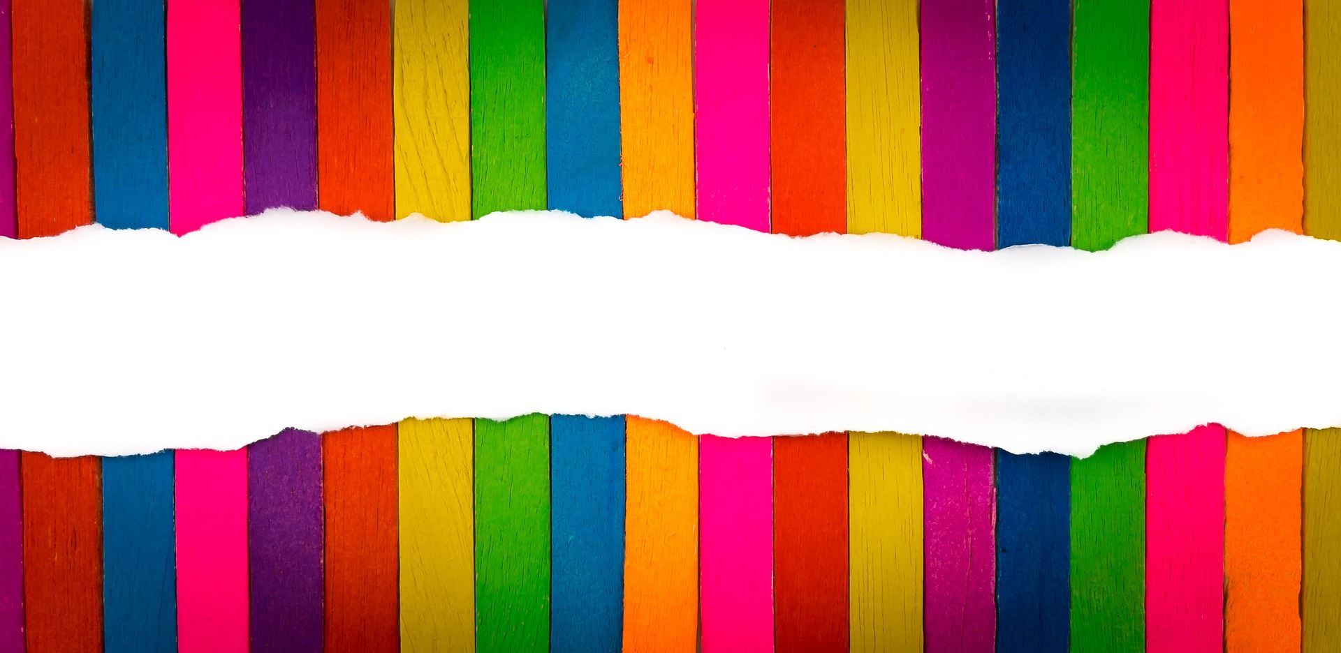 bright, multicolored craft sticks lined up in a display