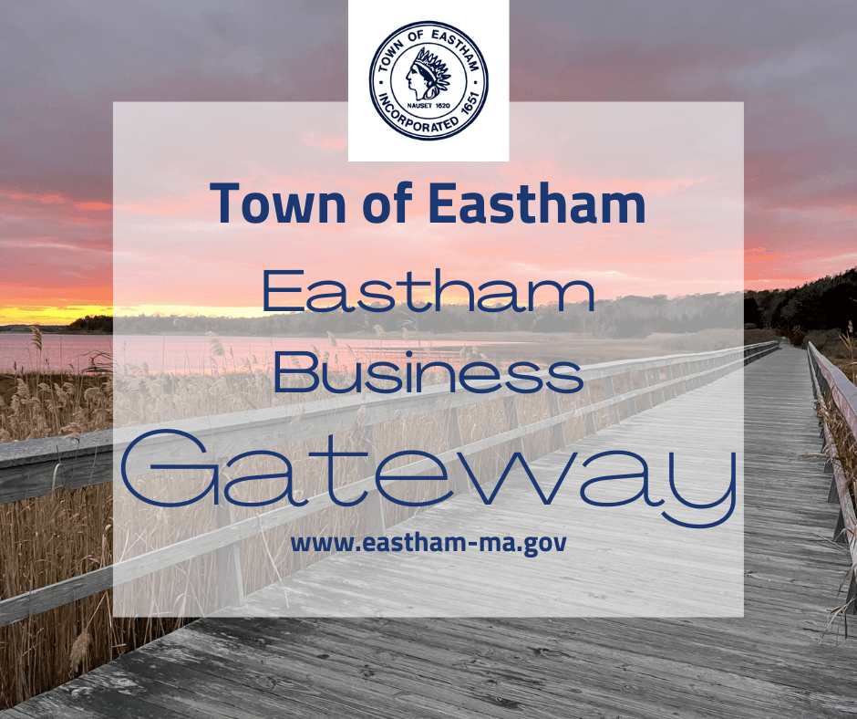 wooden plank bridge with marsh and sunset background text Eastham business gateway