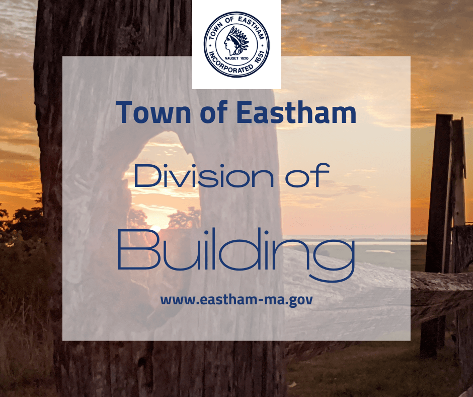 view of orange sunset through fencepost text division of building