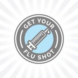 circle with shot in center stating get your flu shot