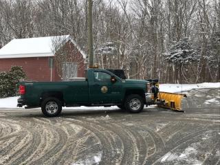 Truck with snow plow attached